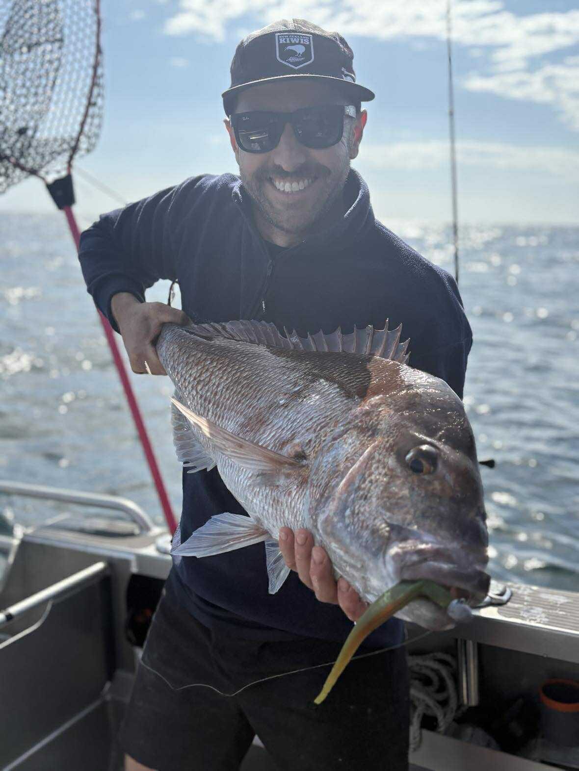 Poenamo Fishing Club members and catches