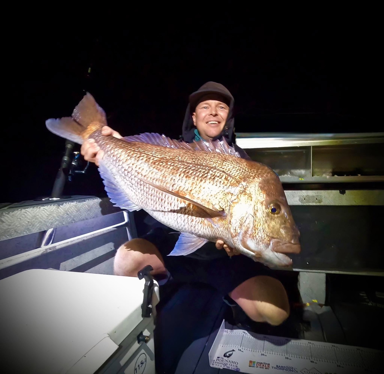 Snapper on the boat at night